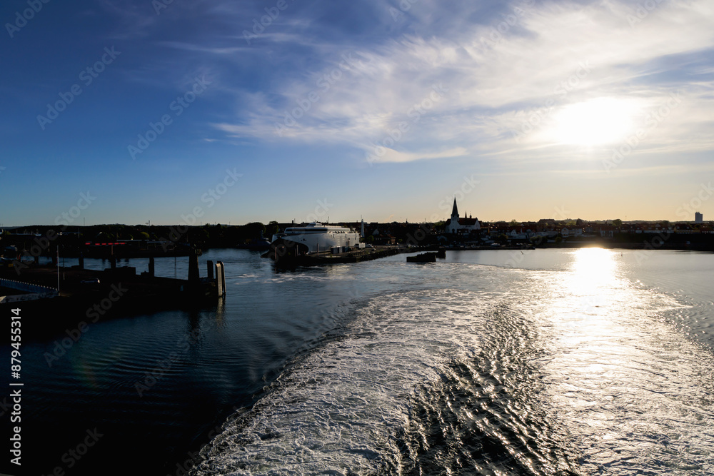 Obraz premium View of the island of Bornholm from the sea in the evening. Bornholm, Denmark 