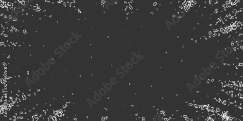 Scattered numbers. White chalk digits flying