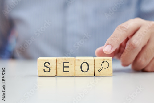 Wooden blocks with letters spelling SEO representing Search Engine Optimization for digital marketing.