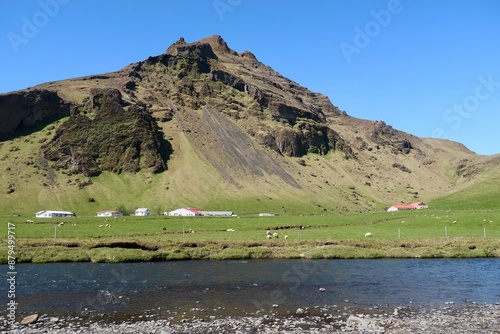 Icelandic summer landscape with lake and mountains.