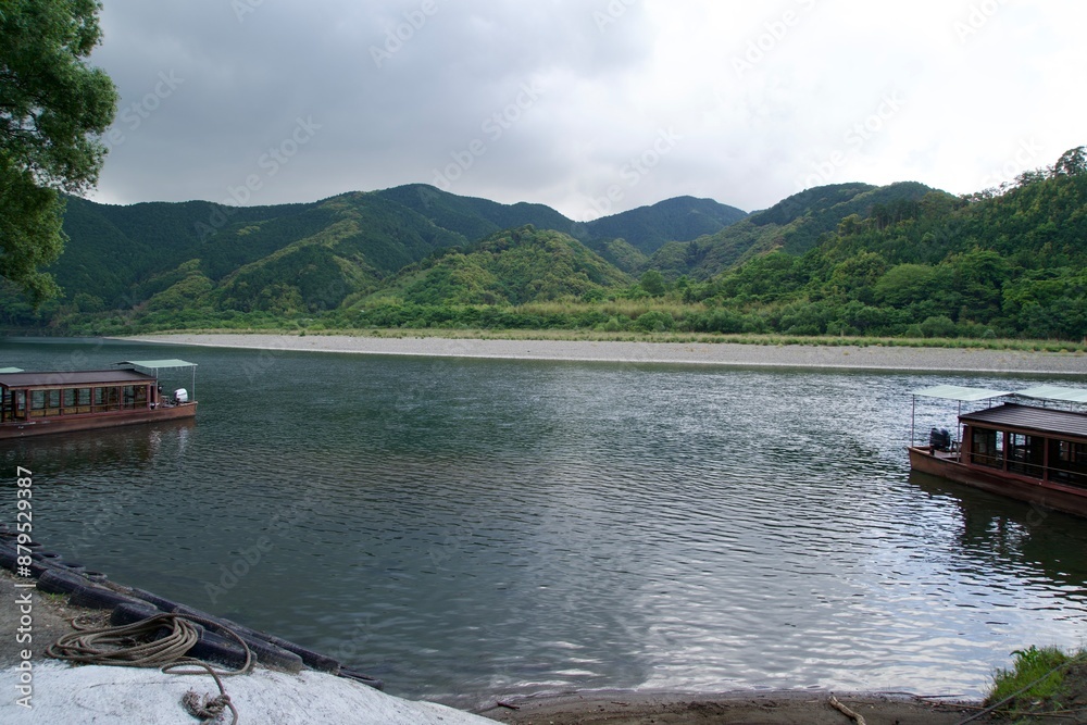 Yakatabune boarding place on the Shimanto River under cloudy skies Yakatabune boarding place on the Shimanto River under cloudy skies