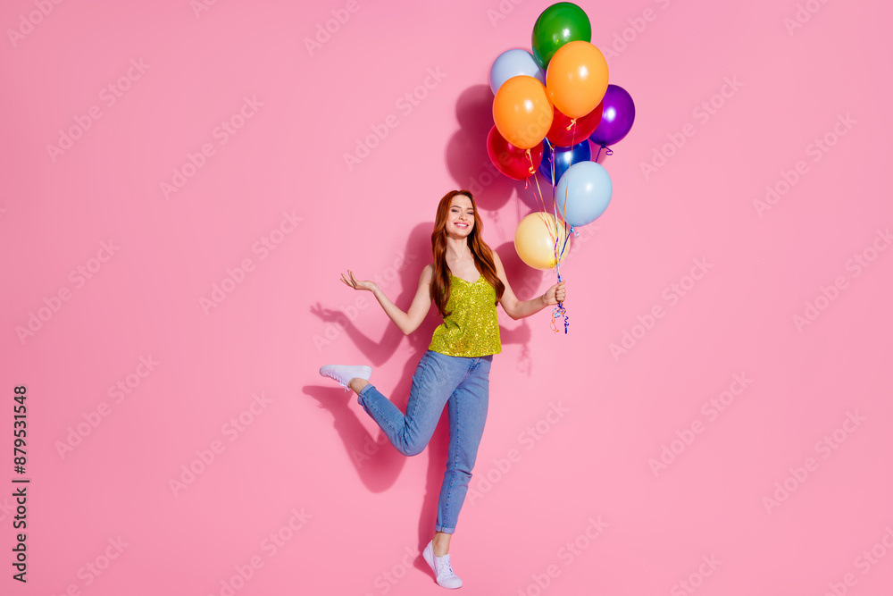 Full size photo of pretty young woman hold balloons wear shiny top isolated on pink color background Full size photo of pretty young woman hold balloons wear shiny top isolated on pink color background