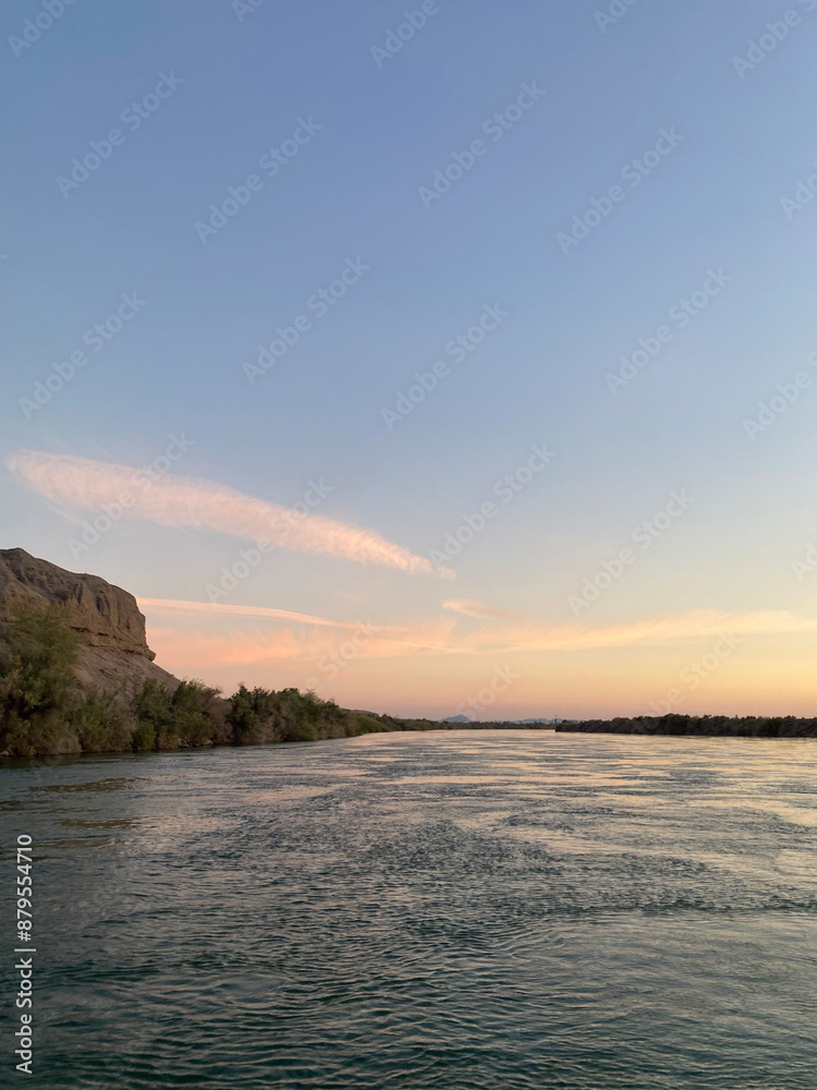 Obraz premium sunset over the river