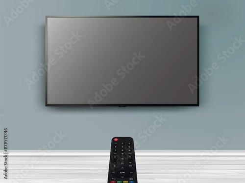 Watching online TV with remote control. Remote control is pointed at the modern flat screen TV on the wall.