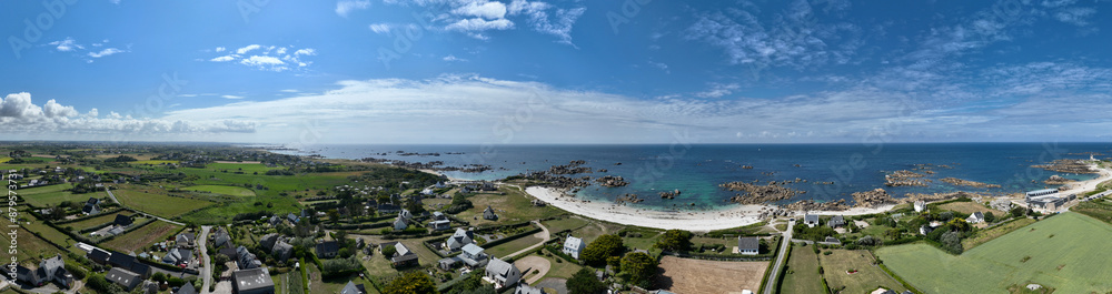 Aerial view of Pontusval Lighthouse and the beaches. Plounour-Brignogan-Plages, France. Rocks singularly shaped. Boats moored in the Atlantic Ocean Aerial view of Pontusval Lighthouse and the beaches. Plounour-Brignogan-Plages, France. Rocks singularly shaped. Boats moored in the Atlantic Ocean