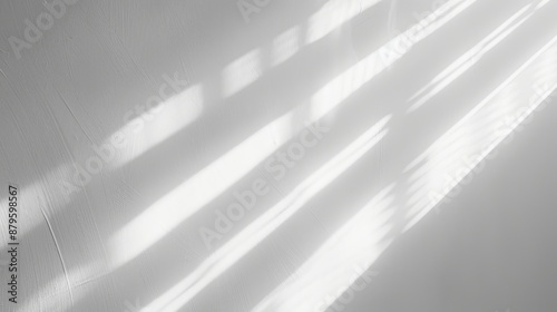 An overlay effect with blurred edges for photos and mockups. A white wall texture with an organic drop diagonal shadow and rays of light. Shadows for natural light effects.