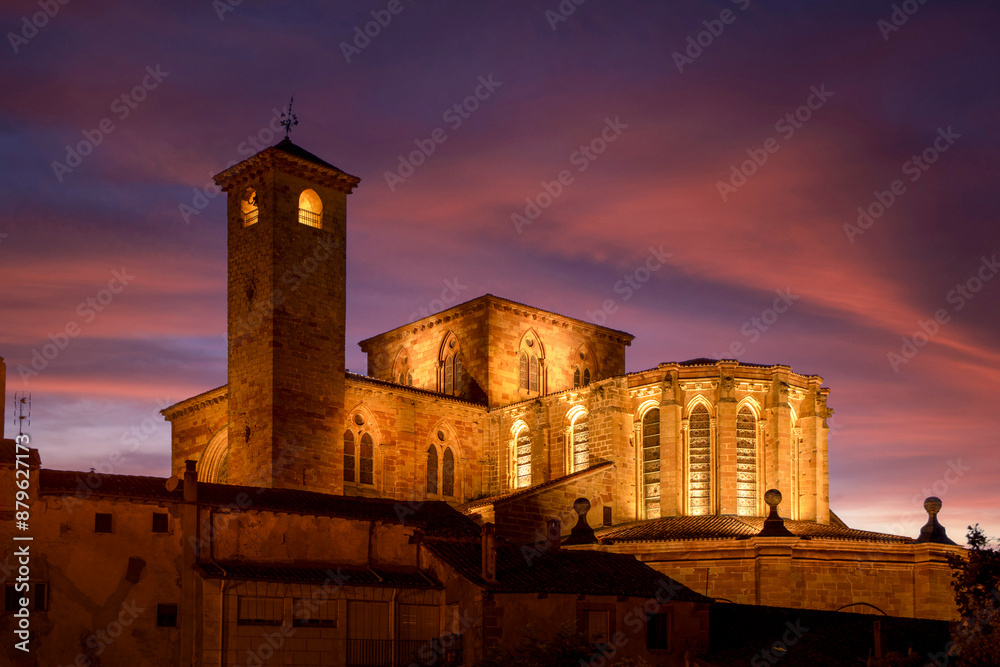 View from a distance of Sigüenza Cathedral, Guadalajara, Castilla-la Mancha, Spain, at dusk and artificially illuminated View from a distance of Sigüenza Cathedral, Guadalajara, Castilla-la Mancha, Spain, at dusk and artificially illuminated