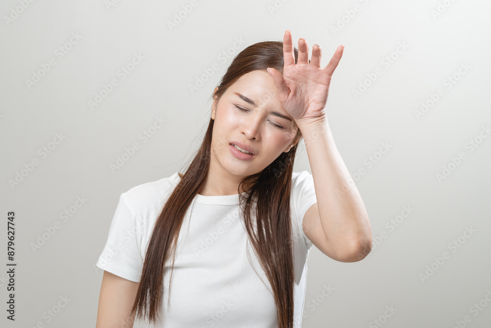 Sweaty young woman feeling discomfort and hot isolated on background Sweaty young woman feeling discomfort and hot isolated on background