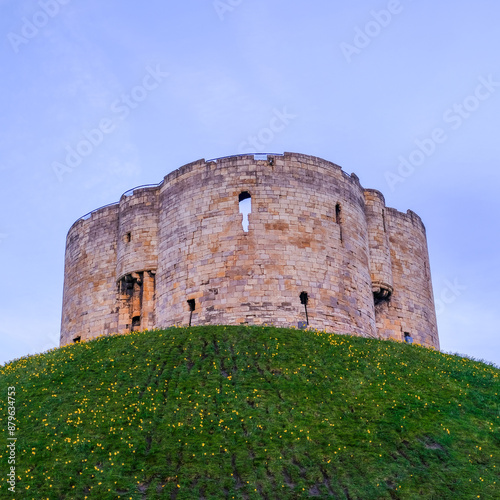 The 13th Century castle known as Clifford's Tower sits atop a mound in the centre of York photo