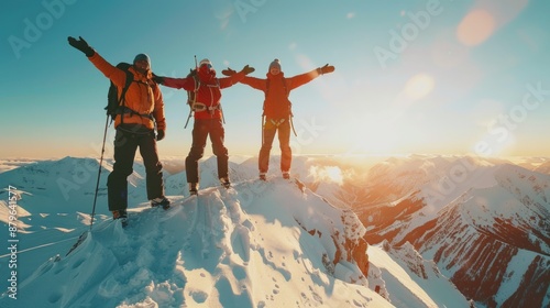 Group of climbers celebrating at the mountain peak