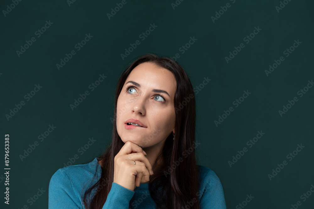 Woman Contemplating With Hand on Chin Woman Contemplating With Hand on Chin
