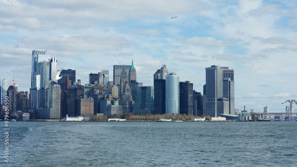 The New York manhattan view from the ferry boat in the sunny day The New York manhattan view from the ferry boat in the sunny day