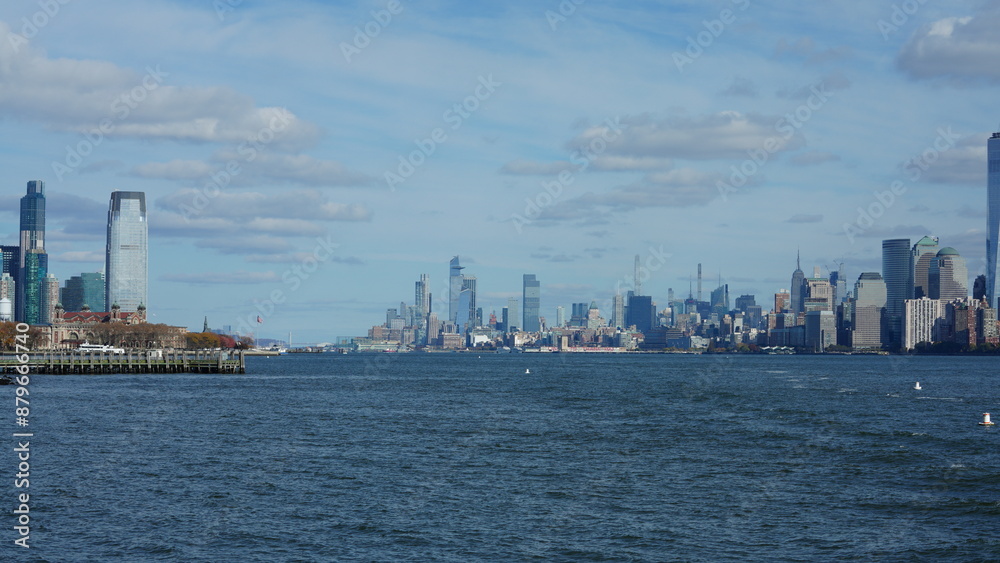 The New York manhattan view from the ferry boat in the sunny day The New York manhattan view from the ferry boat in the sunny day