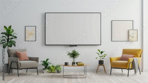 A blank modern flat screen TV hanging on the wall in a minimalist living room.