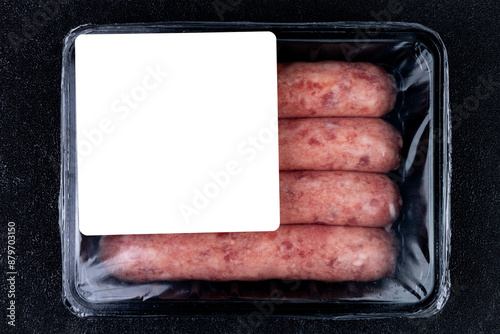 Raw sausages in a plastic container with a close-up label mockup.