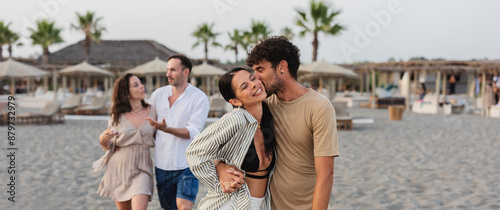 Couples Enjoying a Romantic Beach Evening