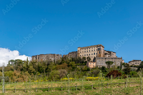 View of the historic center of Bomarzo, Viterbo, Italy, against the blue sky