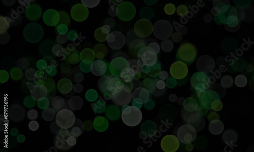 A black abstract background consisting of circles and green-toned bokeh can be used in media design.