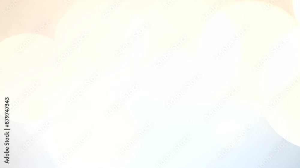 Elegant white bokeh lights floating on a seamless loop, perfect for adding text or graphics.