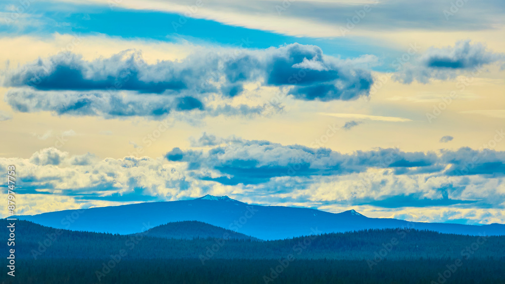 Fototapeta premium Aerial View of Oregon Forest Mountains and Dramatic Sky