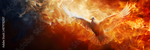 Winged dove in flames, a representation of the New Testament Holy Spirit with copy space. Suitable for religious and spiritual themes.