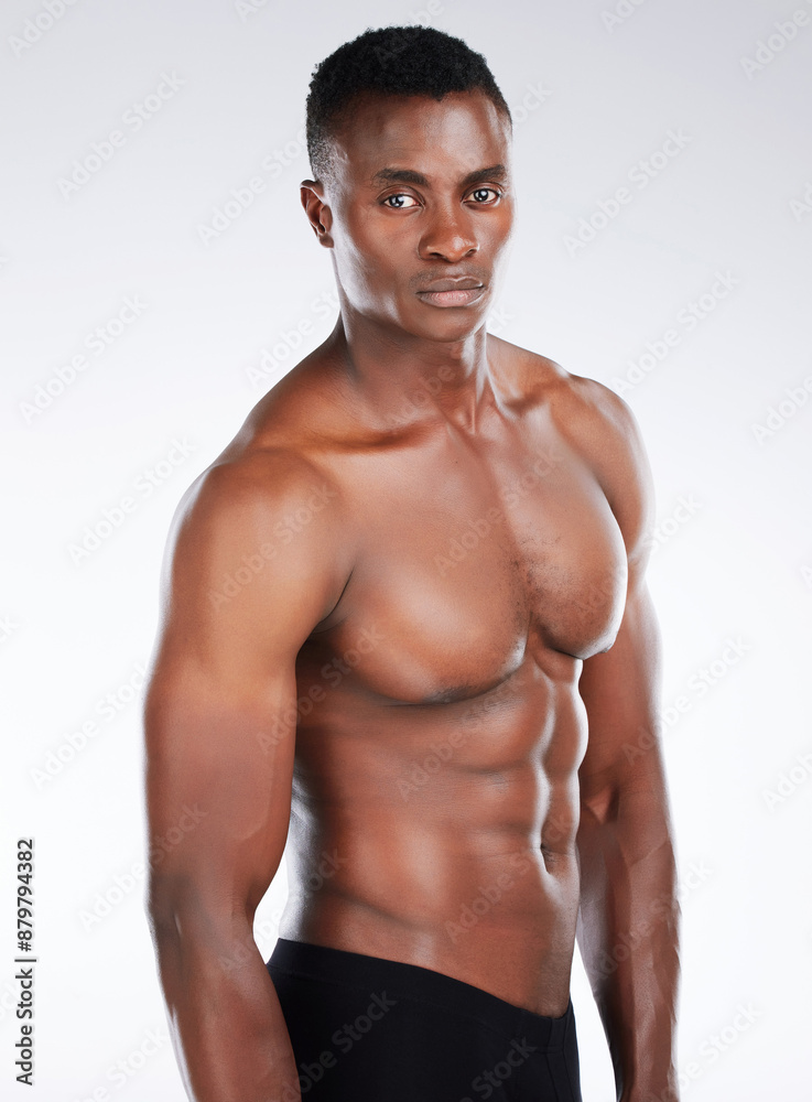 Fototapeta premium Portrait, topless athlete or black man with abs or muscle in studio for health or six pack on white background. Bodybuilder, ripped or strong African person ready for training body or fitness workout