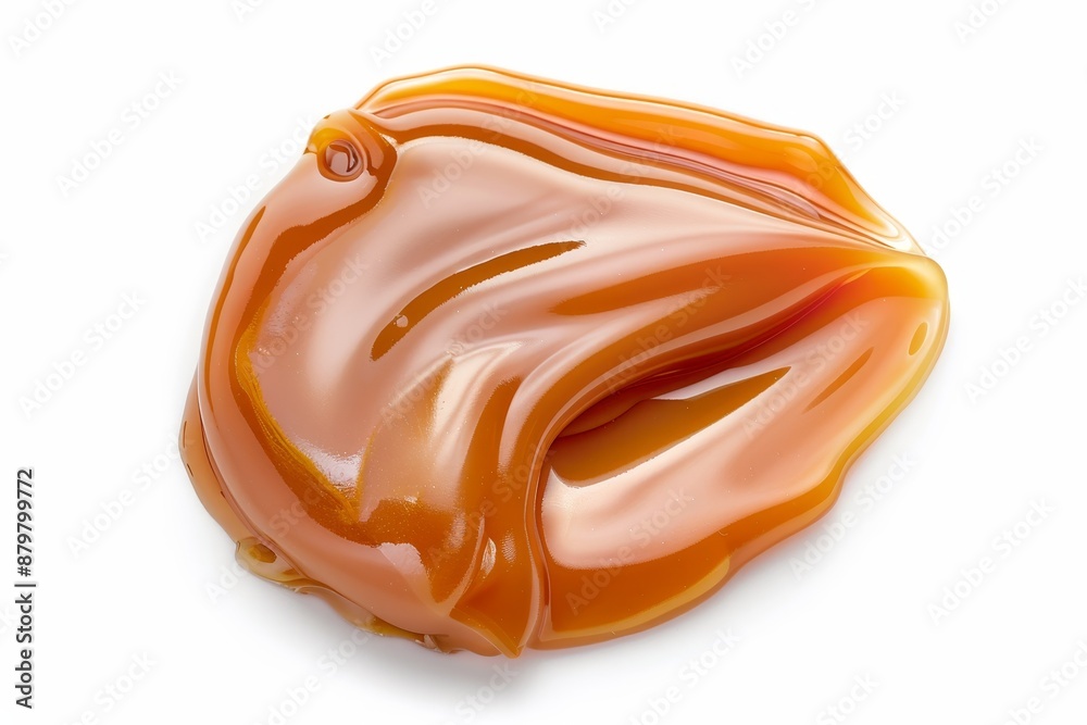 Caramel sauce on white background top view Caramel sauce on white background top view