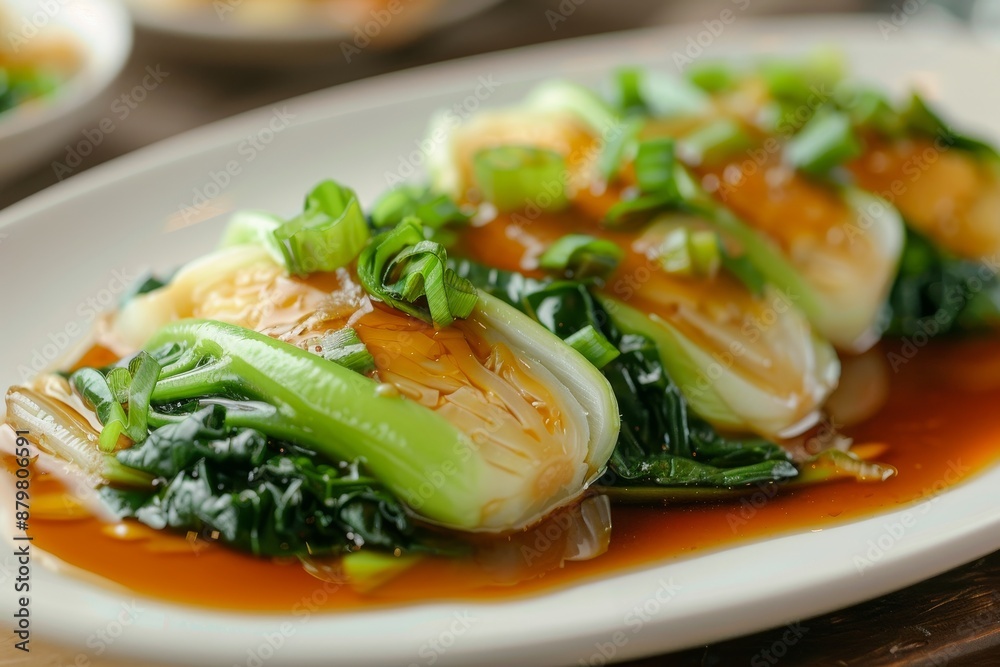 Close up of Cantonese dish Boiled Choy Sum with oyster sauce Close up of Cantonese dish Boiled Choy Sum with oyster sauce