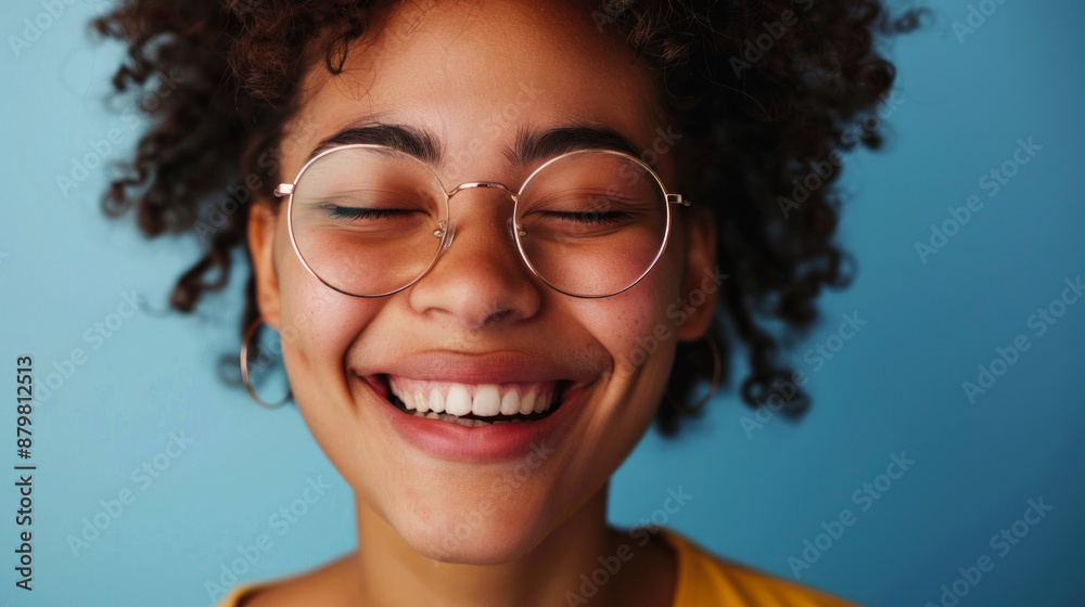 curly woman smiling and using glasses isolated color background, exotic and sweet skin