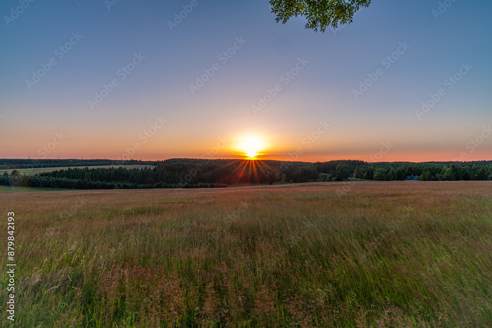 Obraz premium Sunset near Nadrazni alley in sunset color evening in Krusne hory