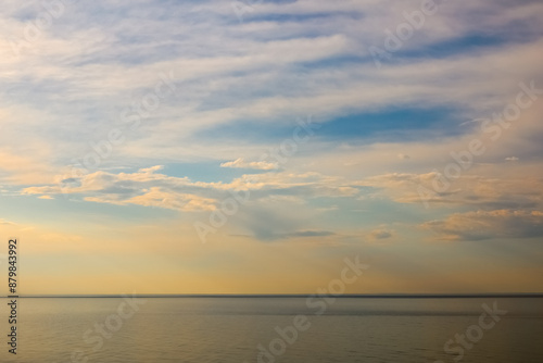 The horizon over the sea with the sky changing to the colours of the approaching sunset, Ustronie Morskie, West Pomerania, Poland