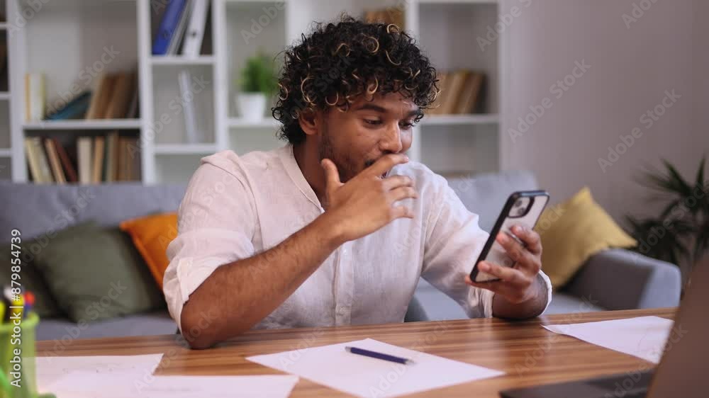 Handsome young indian man get notification and celebrate online win success reading great news message feel amazed happy looking at screen at home workplace indoors Triumph Lucky Handsome young indian man get notification and celebrate online win success reading great news message feel amazed happy looking at screen at home workplace indoors Triumph Lucky