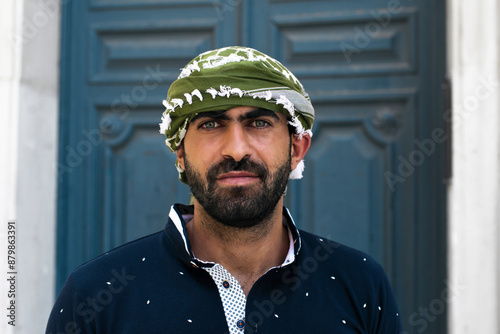 Portrait of Palestinian man with his classic "hata" headscarf