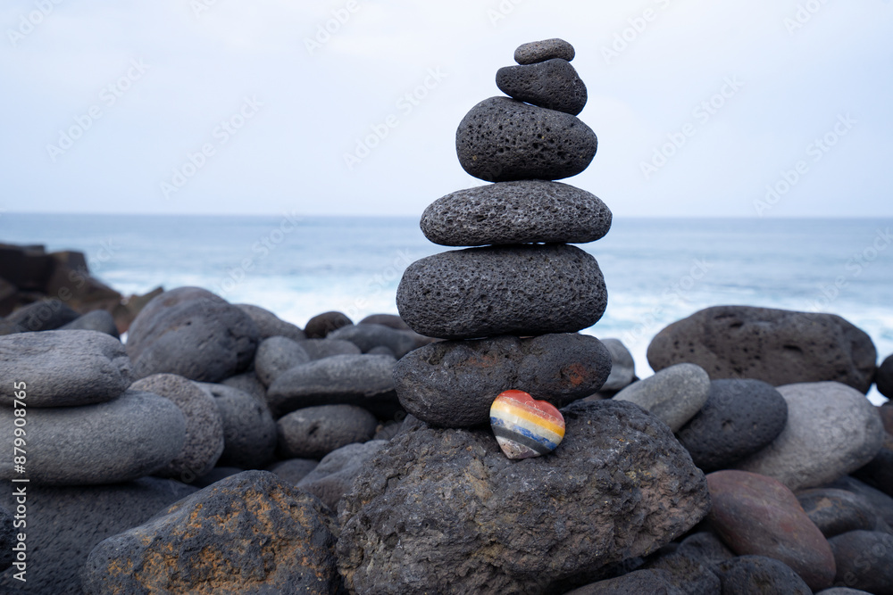 Balance stone tower on wild sea shore Balance stone tower on wild sea shore