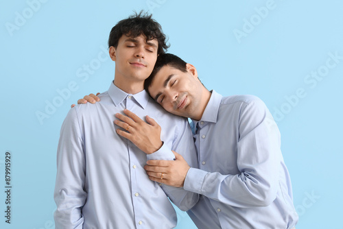 Married gay couple hugging ...