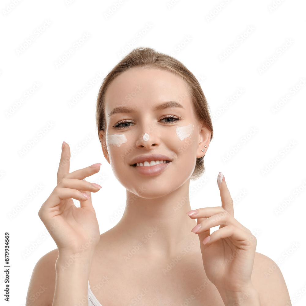 Beautiful woman with cream pointing at something on white background Beautiful woman with cream pointing at something on white background