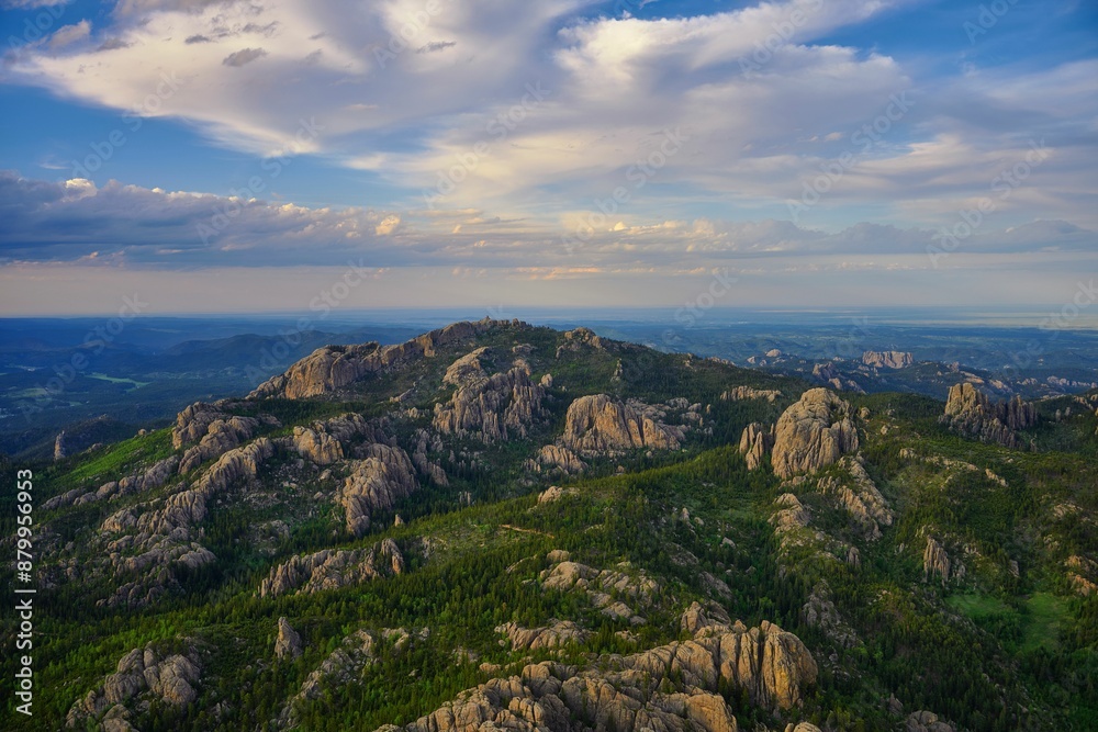 Obraz premium Aerial view of the Black Hills with blue sky in South Dakota at golden sunset