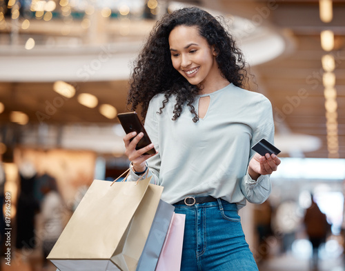 Konstfotografi Happy woman, shopping bags and phone with credit card at mall for easy payment or ecommerce