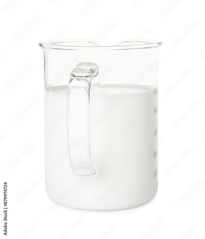 Fresh milk in measuring cup isolated on white Fresh milk in measuring cup isolated on white