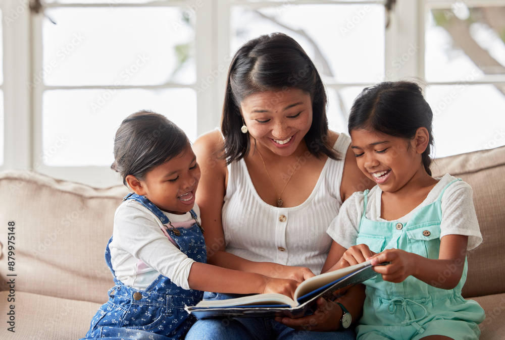 Happy family, children and mother reading book on couch for learning, bonding or teaching in home together. Smile, education and mom with kids storytelling for fairytale, fantasy or child development Happy family, children and mother reading book on couch for learning, bonding or teaching in home together. Smile, education and mom with kids storytelling for fairytale, fantasy or child development