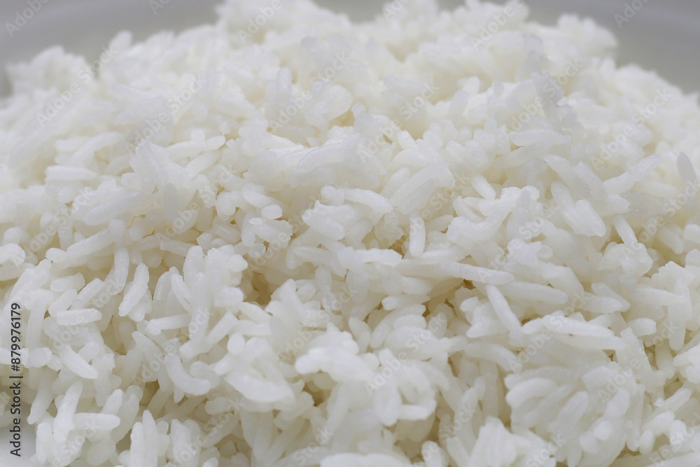 Cooked rice in bowl on yellow background. Cooked rice in bowl on yellow background.