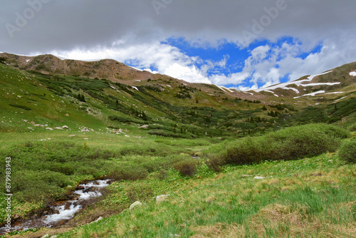 hiking  a sunny summer day  along the upper straight creek trail in summit county near the eisenhower tunnel in the rocky mountains of colorado    