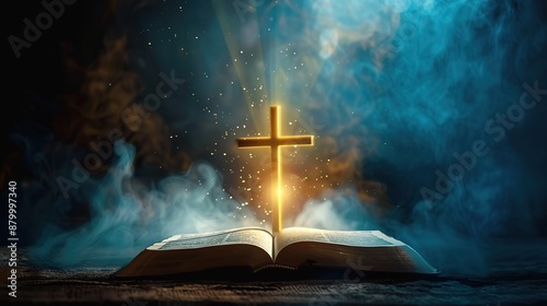 Open holy Bible with glowing cross and smoke
