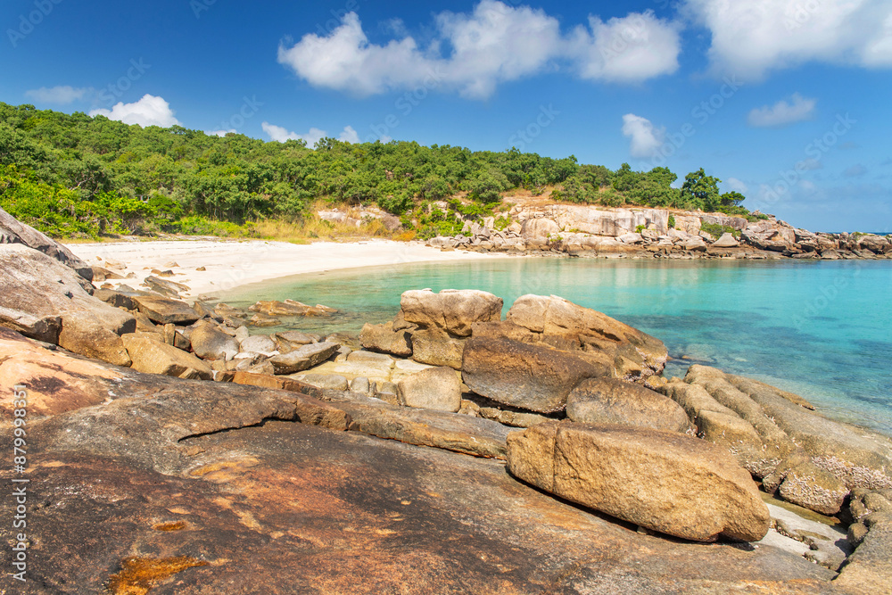 Picturesque tropical Pebbly Beach with turquoise water on Lizard Island, Australia. Lizard Island is located on Great Barrier Reef in north-east part of Queensland