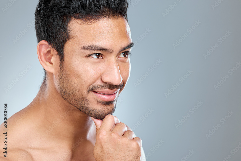 Hand, man and idea dermatology in studio for skincare, grooming and wellness or pride for glow. Male model, inspiration and facial or treatment for shine, routine and hygiene by gray background Hand, man and idea dermatology in studio for skincare, grooming and wellness or pride for glow. Male model, inspiration and facial or treatment for shine, routine and hygiene by gray background