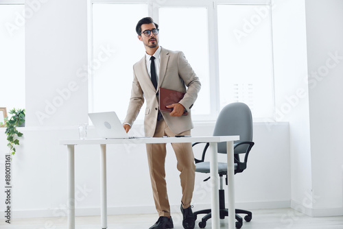 Man laptop business winner table office businessman suit technology scream job winning happy