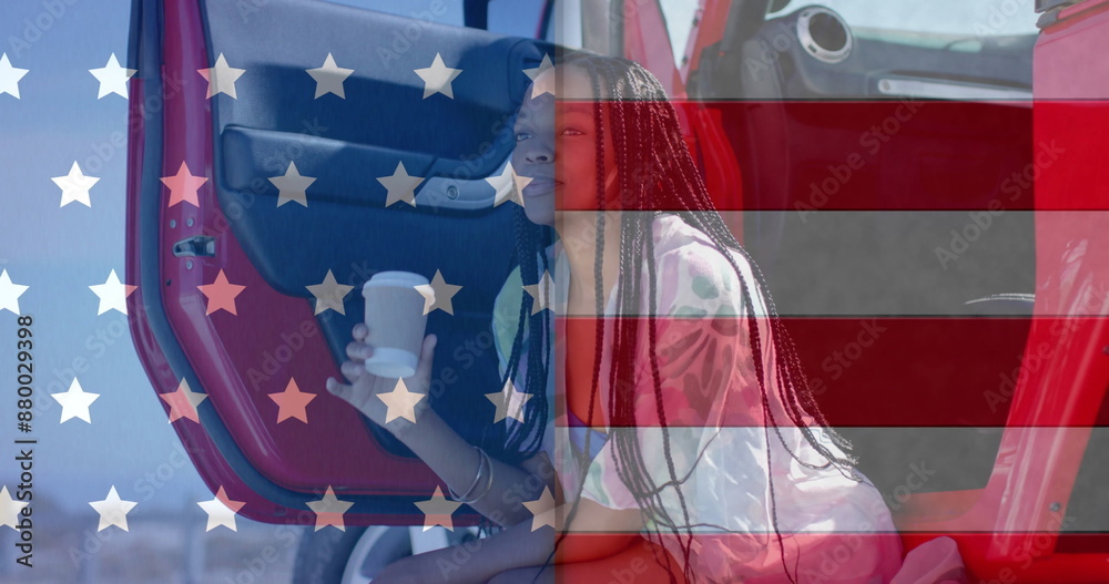 Obraz premium Image of flag of usa over happy african american woman in car drinking coffee in car by beach