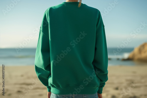 Obraz na płótnie Back view of a woman wearing sweatshirt outdoors, mockup clothing concept. w salonie