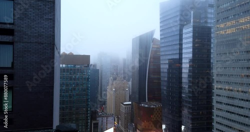 Time lapse in midtown New York City during an April sunrise with low fog