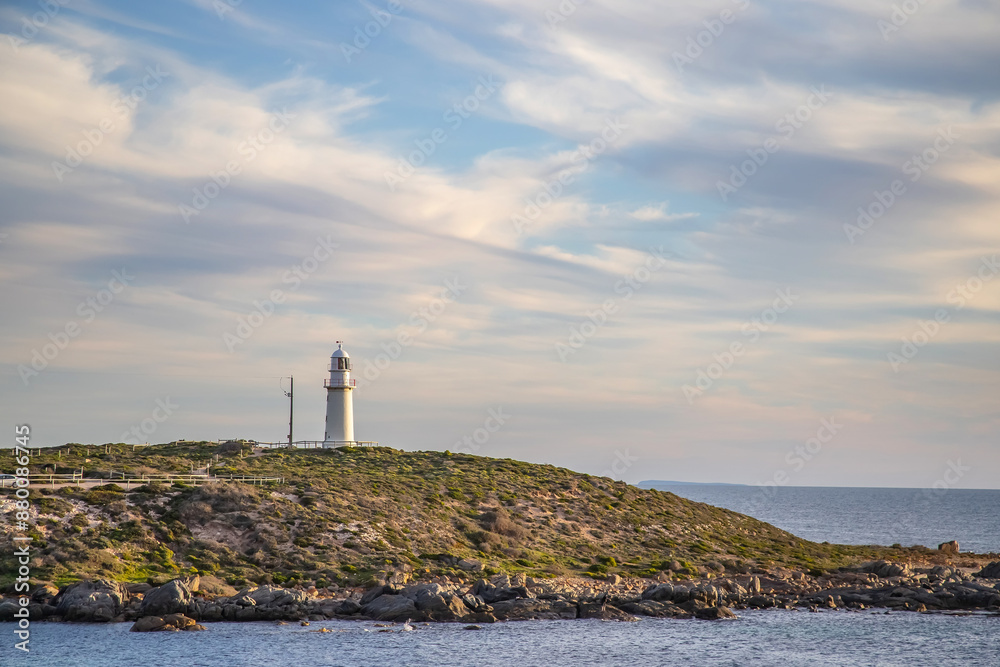 Lighthouse on the ocean, seascape, danger warning symbol, Australian coast Lighthouse on the ocean, seascape, danger warning symbol, Australian coast